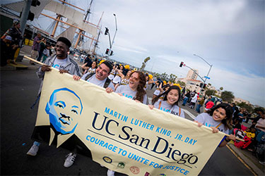 https://www.risetogethermag.com/wp-content/uploads/2025/03/mlk-parade-2020.jpg